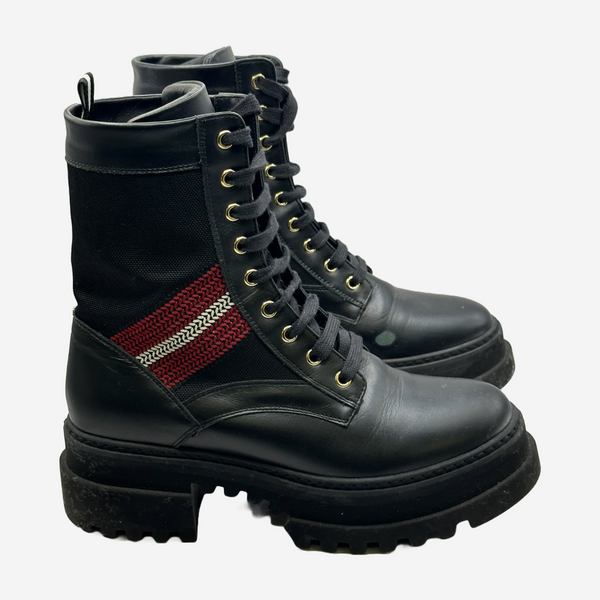 Bally women's black leather and canvas combat boots with red