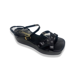 pre-owned CHANEL black CC logo leather platform sandals | Size 38
