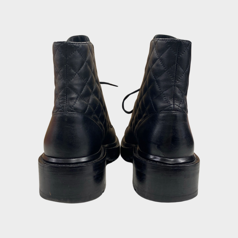 Chanel women's black CC quilted boots with flap