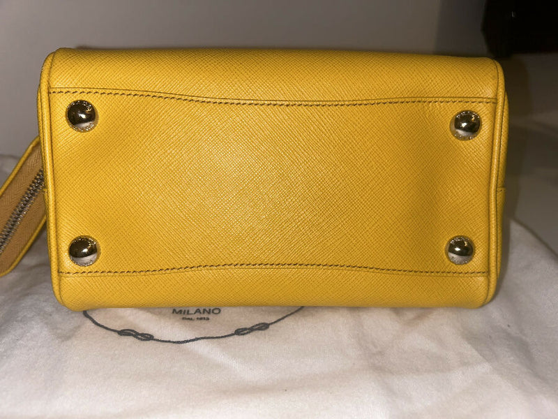 Prada yellow saffiano leather bauletto handbag with shoulder strap and pouch