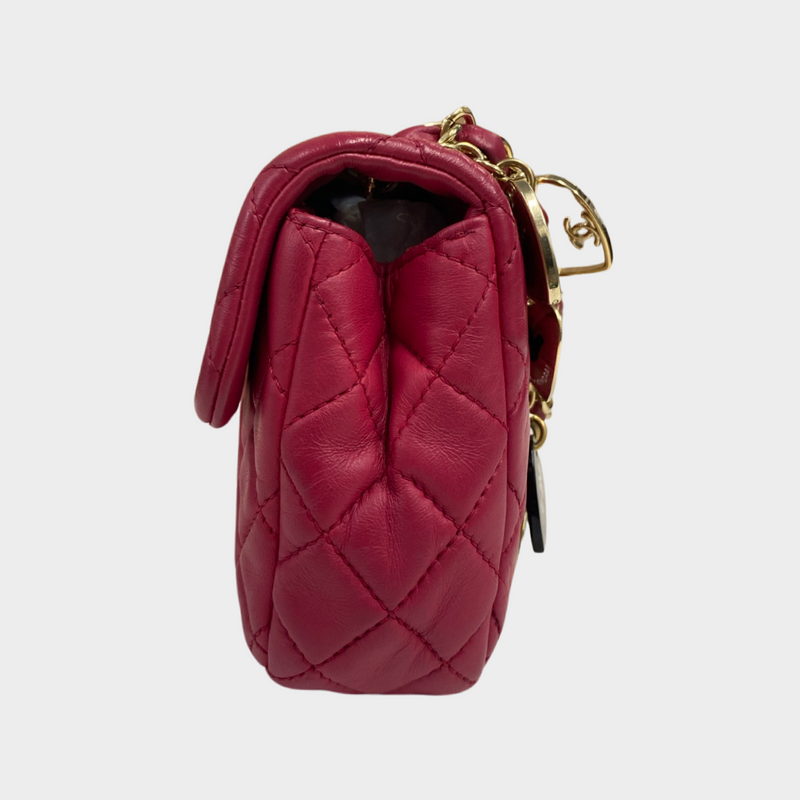 Chanel women's raspberry leather quilted flap bag with metal heart charms