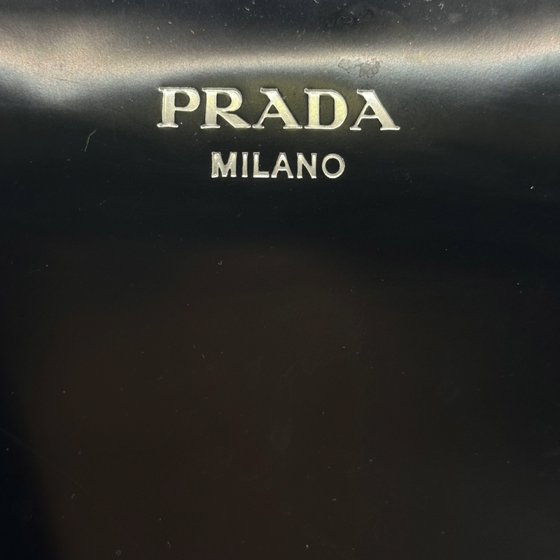 Prada black patent leather Supernova handbag with logo details on the sides