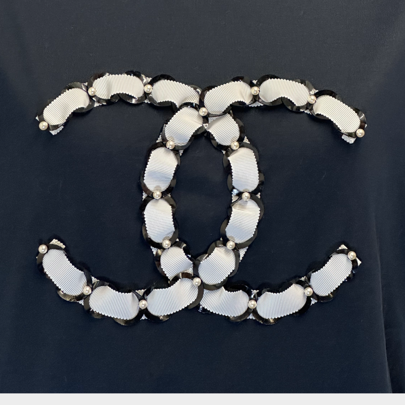 CHANEL navy cotton cap-sleeved t-shirt with white ribbon and pearl CC logo detail