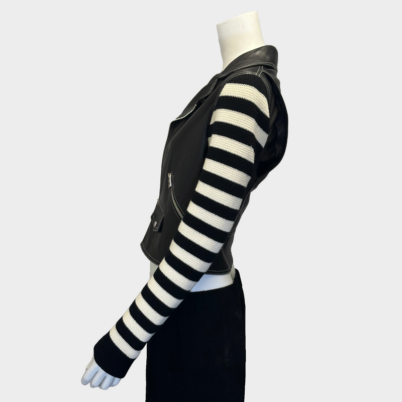 Loewe women's black and white leather biker jacket with striped knitted sleeves