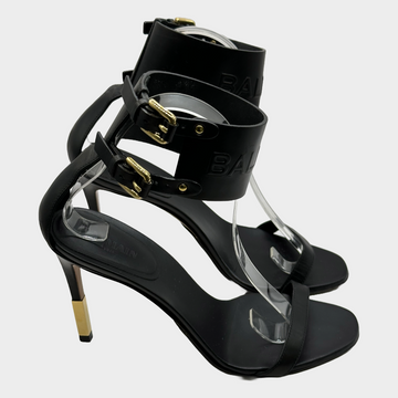 Balmain black leather ankle logo strap heels with gold tone