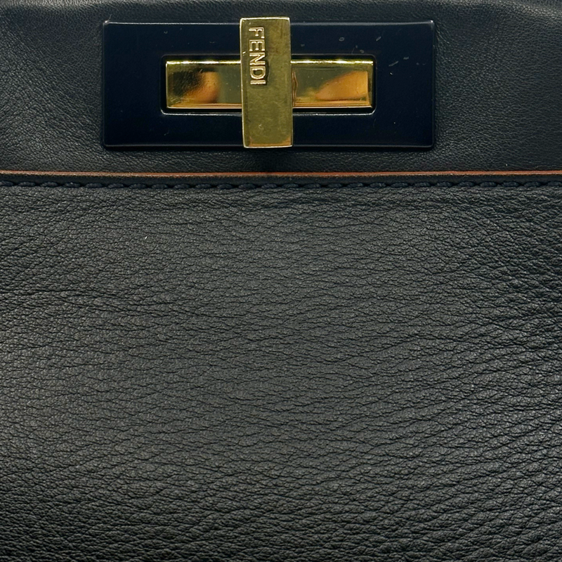 Fendi navy grained leather peekaboo bag with orange detail at the edges