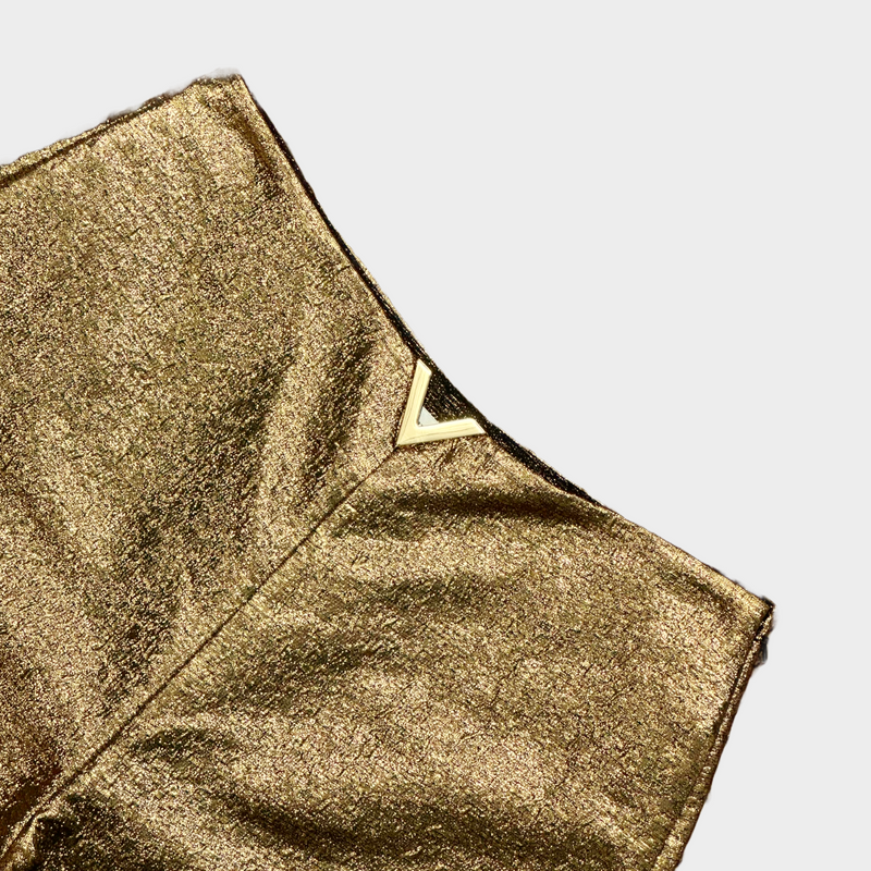 Valentino gold metallic shorts with V detail at the front