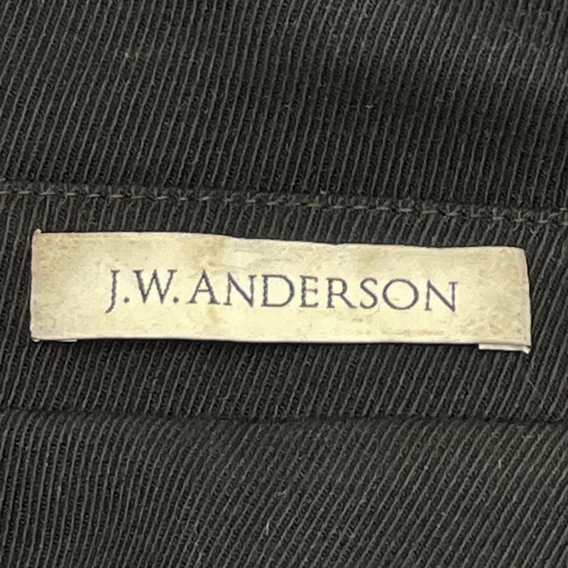 J.W. Anderson black polyester coat with metal flowers buttons