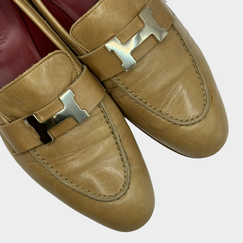 Hermes women's beige leather loafers with silver tone H buckle