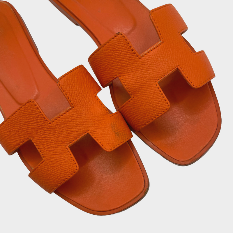 Hermes women's orange sunset leather "Oran" sandal