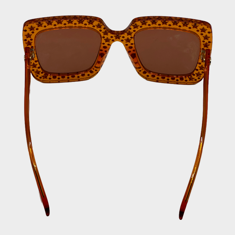 Gucci women's orange clear square sunglasses with star rhinestones embellishments