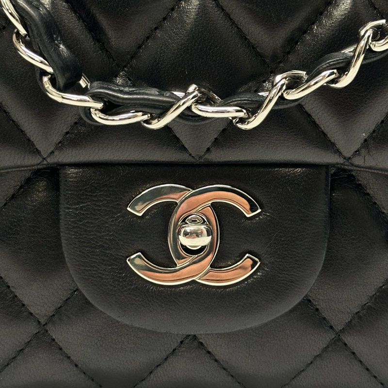 Chanel women's black lambskin leather jumbo classic flap handbag