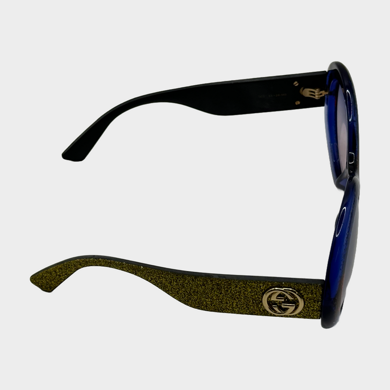Gucci women's red and blue glittered round sunglasses with gold glittered side