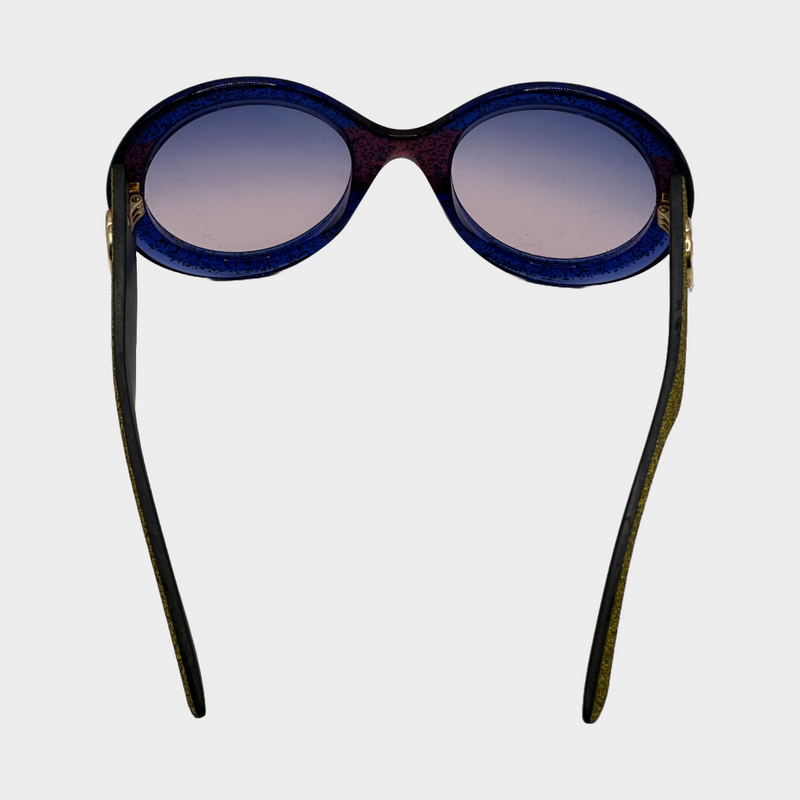 Gucci women's red and blue glittered round sunglasses with gold glittered side