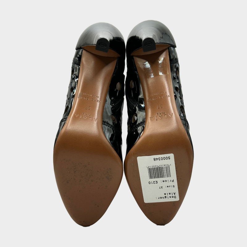 ALAÏA black patent leather laser cut ankle boots