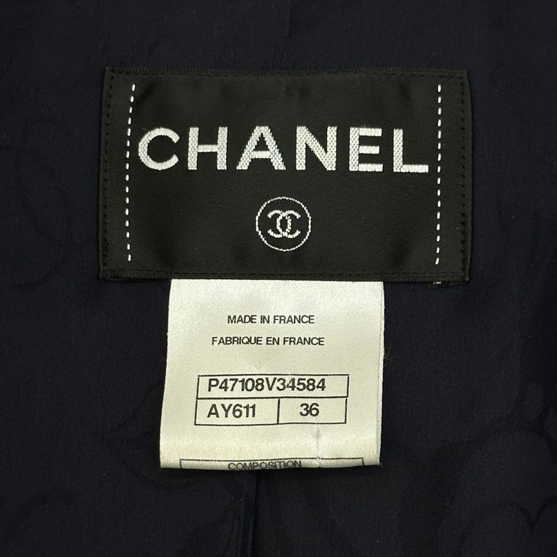 Chanel women's navy and black tweed jacket with silver hardware