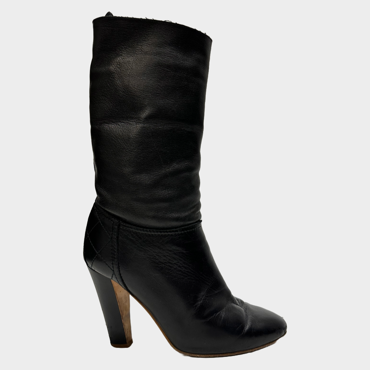 Chanel women s black leather heeled boots Loop Generation