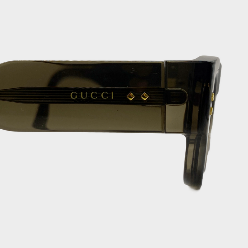 Gucci men's grey clear acetate sunglasses