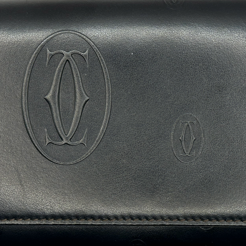 Cartier women's black leather embossed logo wallet