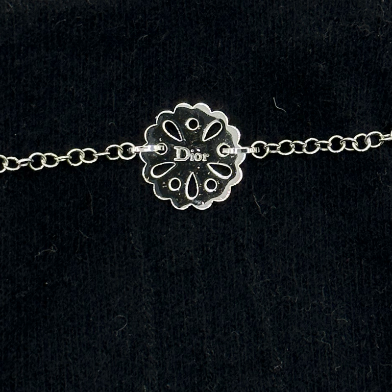 Christian Dior women's black wool gloves with silver chain and flower detail