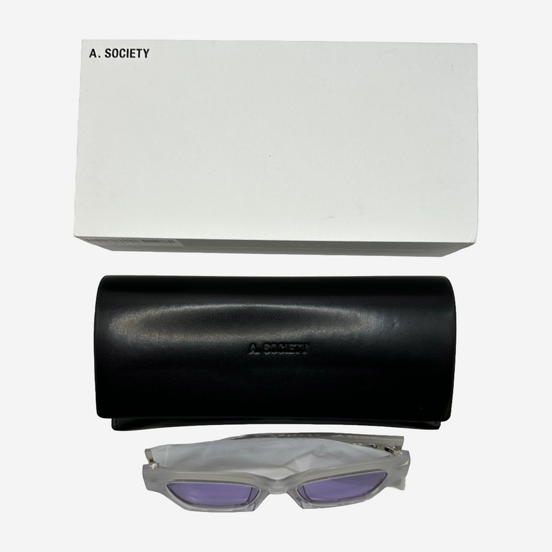 A. Society clear acetate cat eye sunglasses with purple tinted lenses