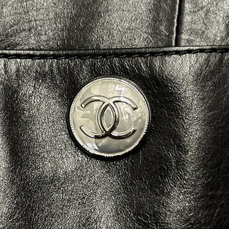 Chanel women's black and white leather cropped biker jacket