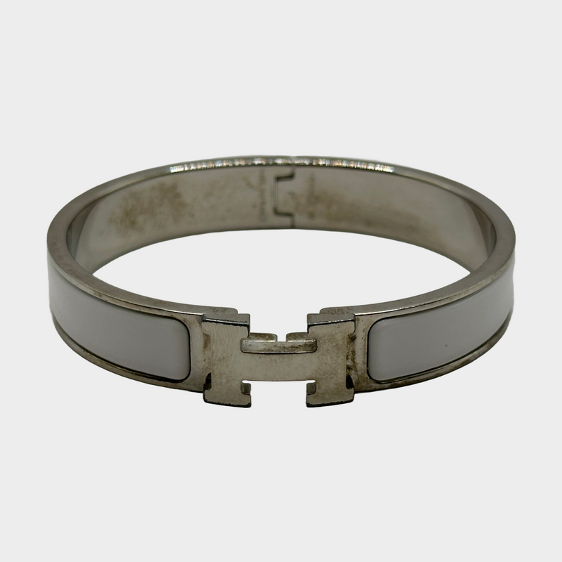 HERMÈS women's Clic H silver bracelet with white enamel