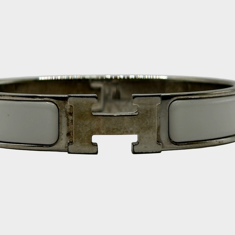 HERMÈS women's Clic H silver bracelet with white enamel