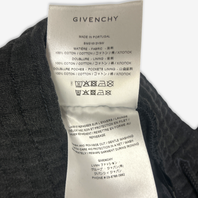 Givenchy men's black cotton distressed double-layer shorts