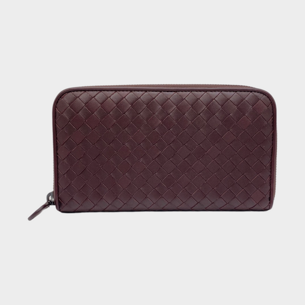 Bottega Veneta burgundy leather intrecciato zip around wallet