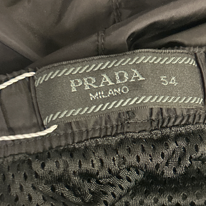 Prada men's black swimming trunks with triangle logo detail