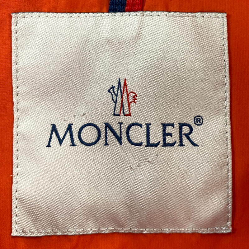 Moncler men's orange rain jacket with front zipper