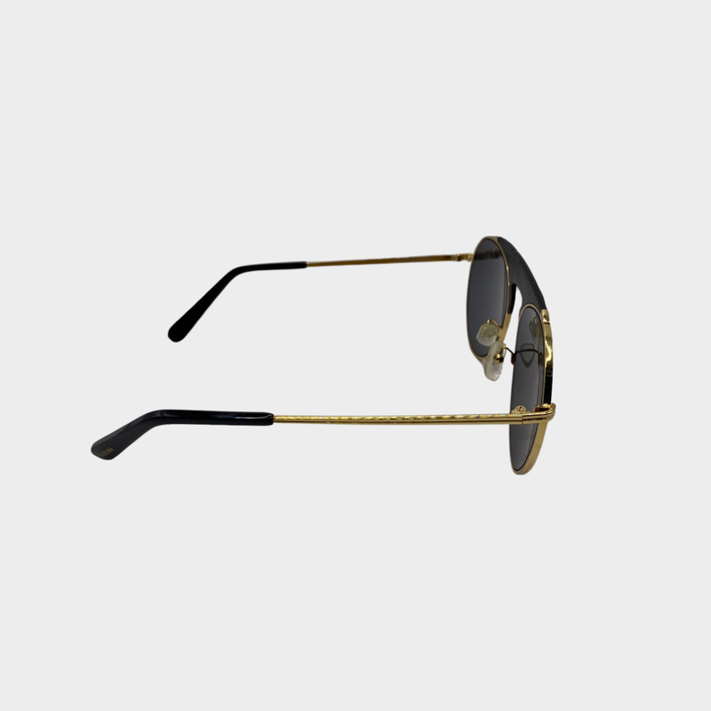 Loewe women's black lens with gold frame and leather detailing