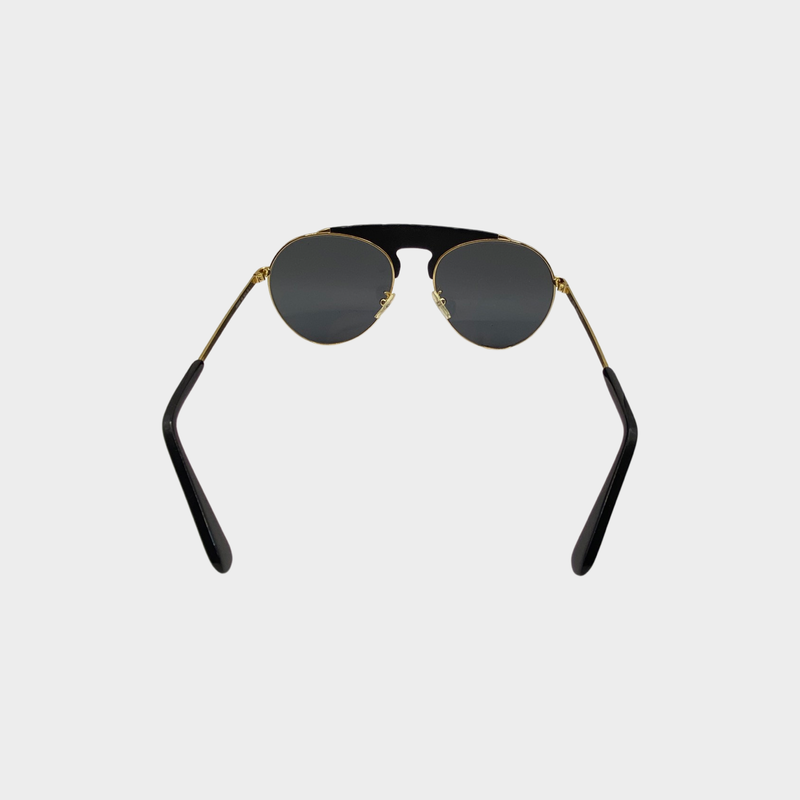 Loewe women's black lens with gold frame and leather detailing