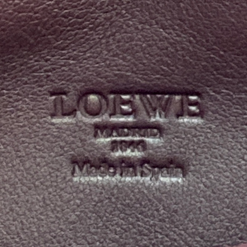 Loewe women's burgundy leather small travel bag