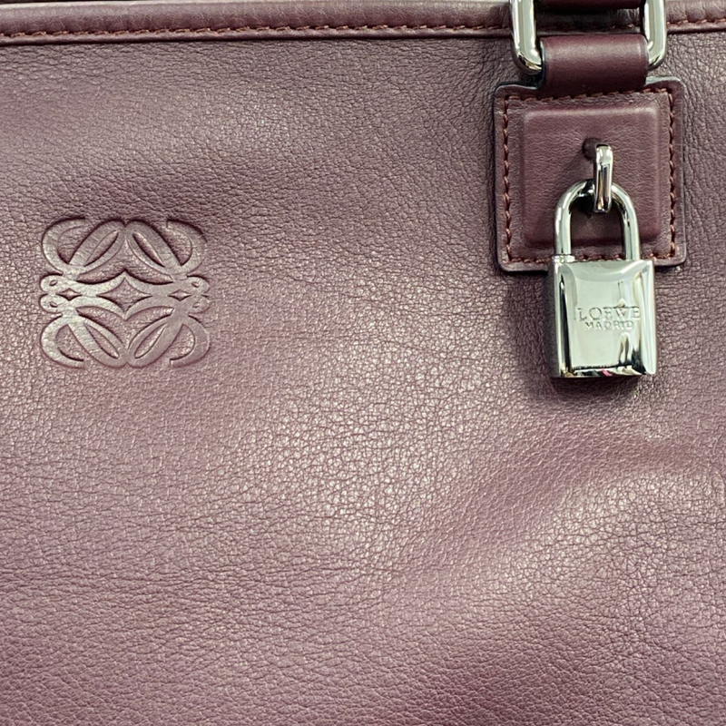 Loewe women's burgundy leather small travel bag