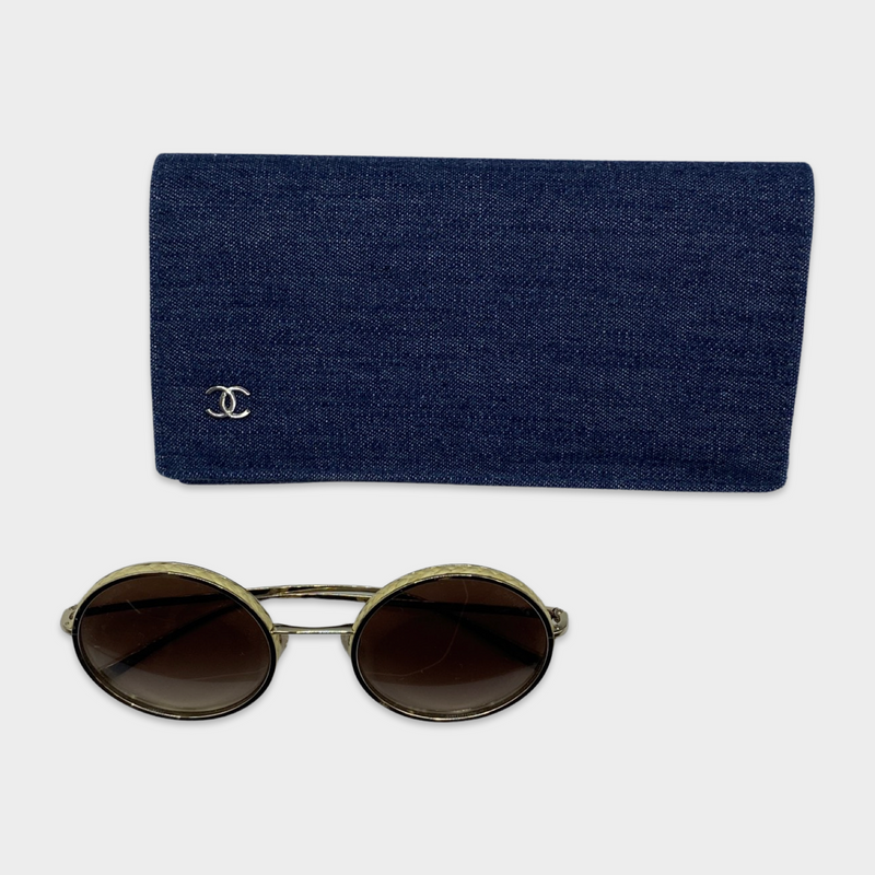 Chanel women's brown sunglasses with beige details and gold sides