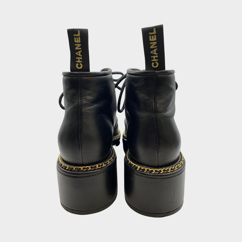 Chanel women's CC black boots with gold chain