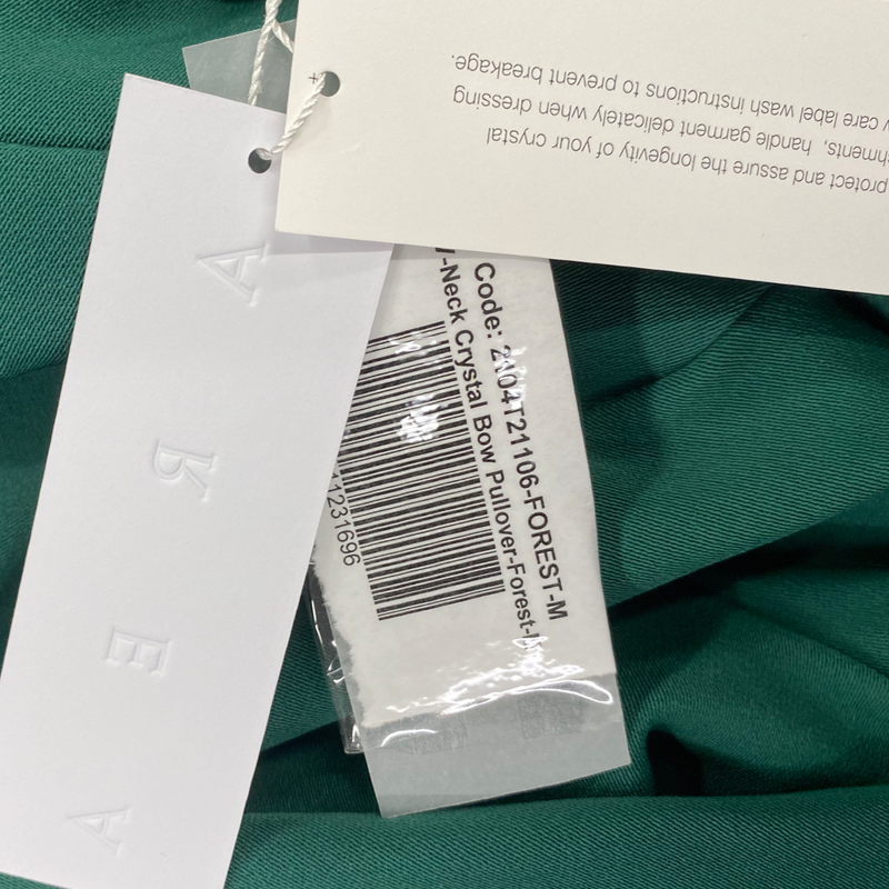 Area women's green crystal-trimmed set