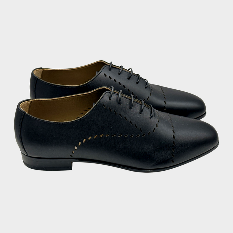 Hermes women's black leather laser cut loafers