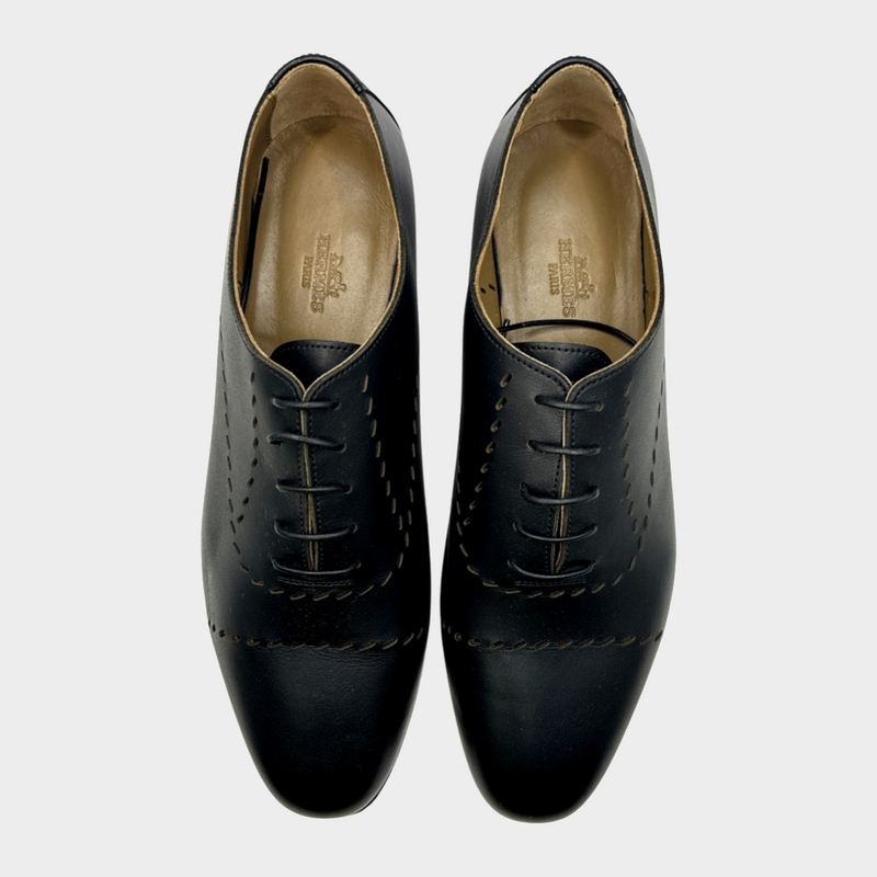 Hermes women's black leather laser cut loafers