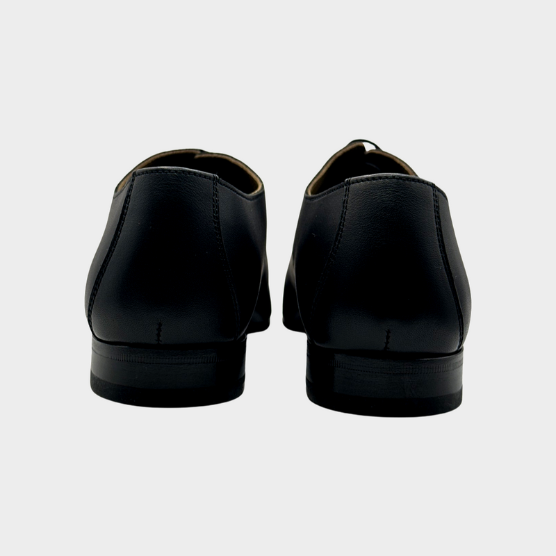Hermes women's black leather laser cut loafers