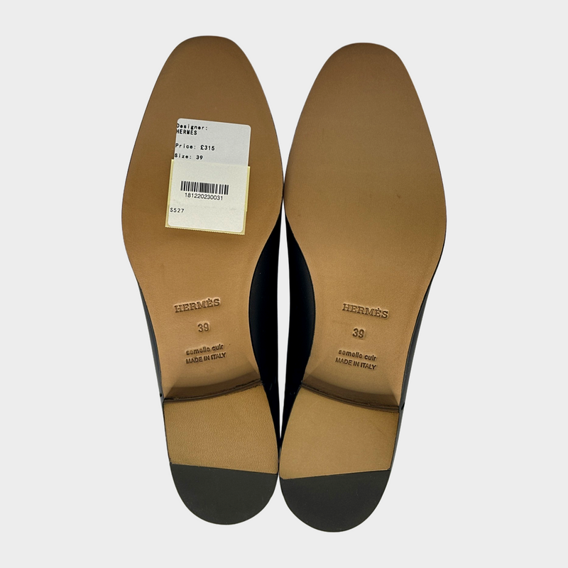 Hermes women's black leather laser cut loafers