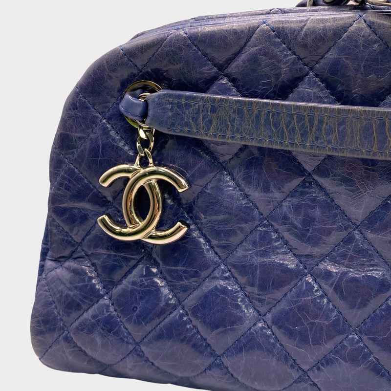 Chanel women's blue quilted leather moon-shaped vintage handbag