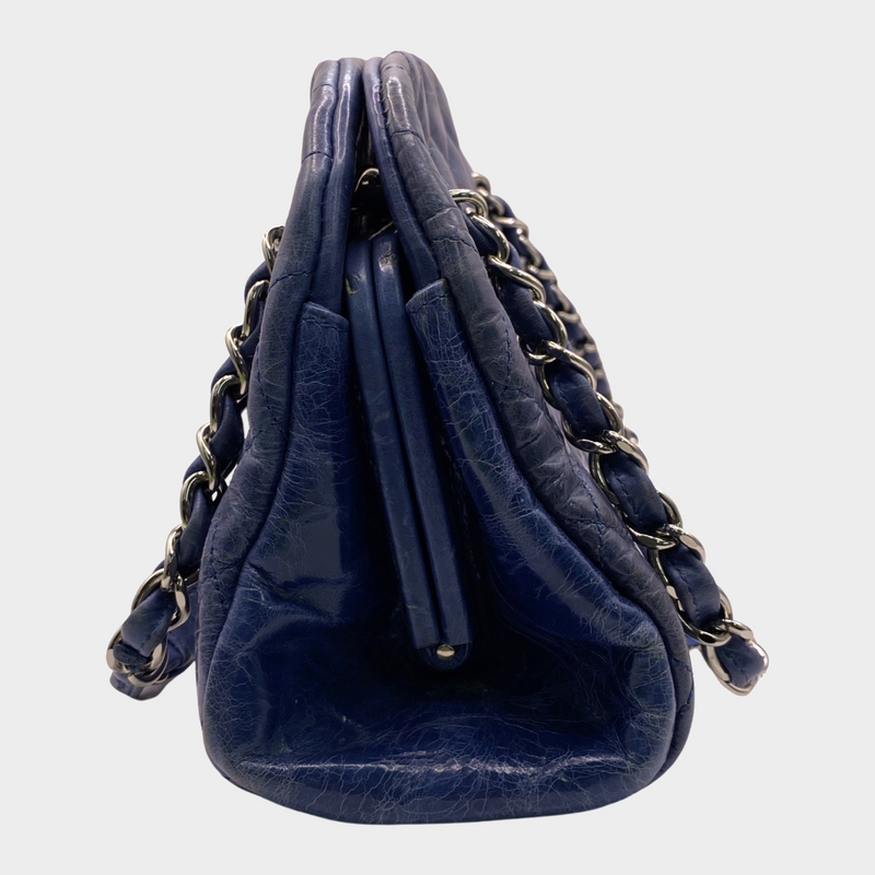 Chanel women's blue quilted leather moon-shaped vintage handbag