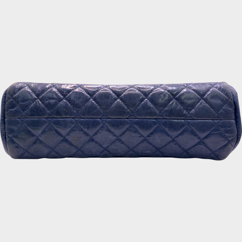 Chanel women's blue quilted leather moon-shaped vintage handbag