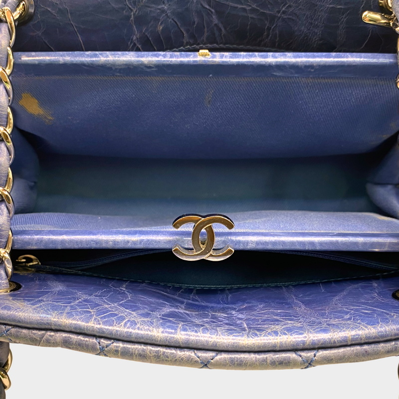 Chanel women's blue quilted leather moon-shaped vintage handbag