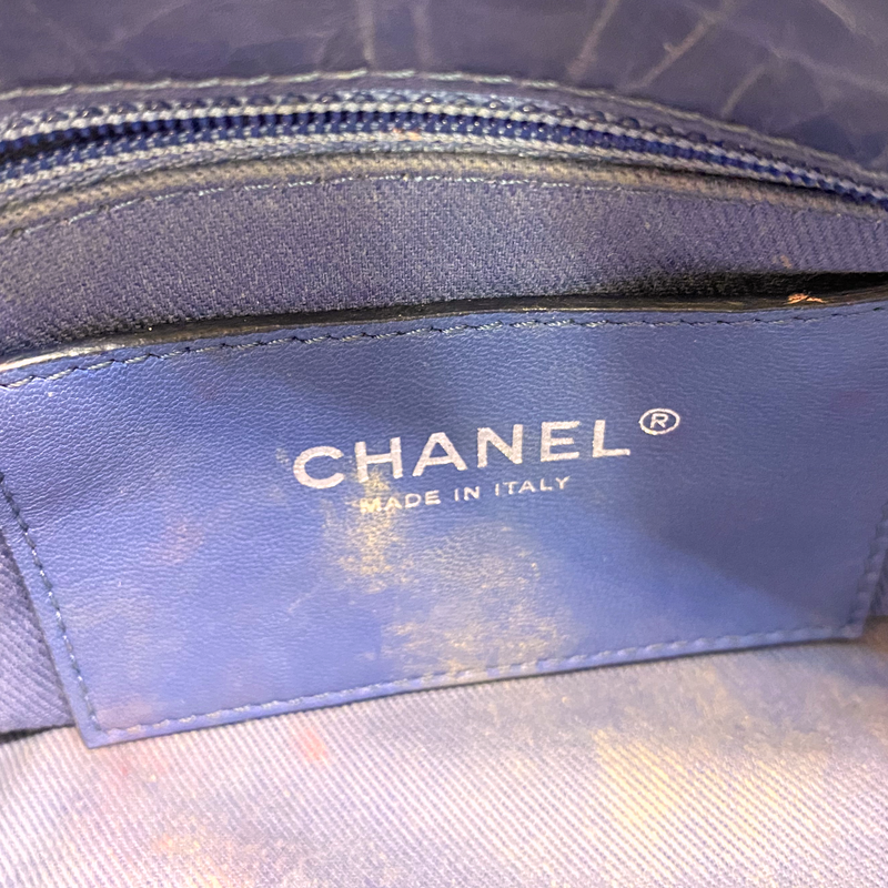 Chanel women's blue quilted leather moon-shaped vintage handbag