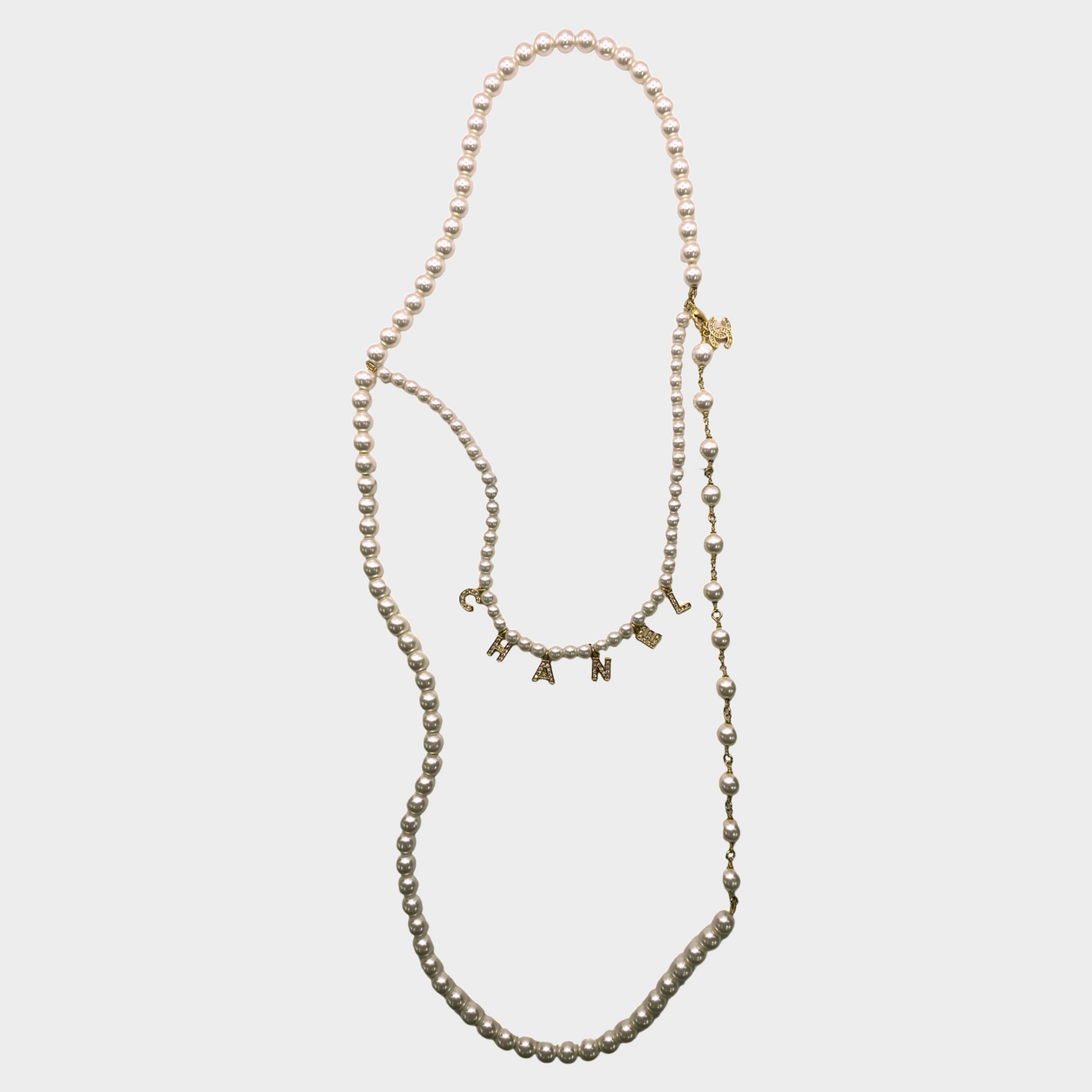 Chanel women's dual layer pearl necklace with diamante letter