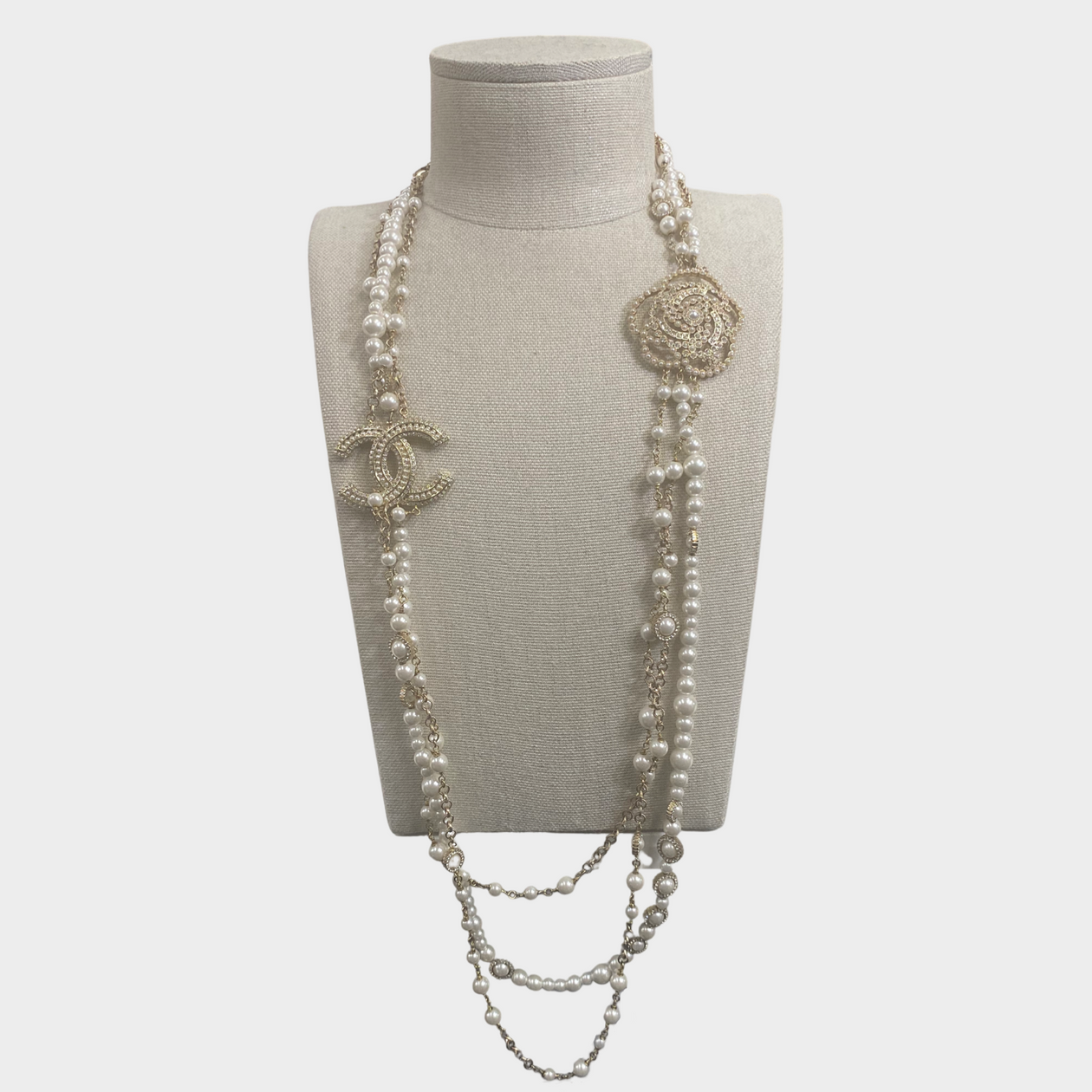 Chanel women's triple layer gold pearl necklace with diamante CC